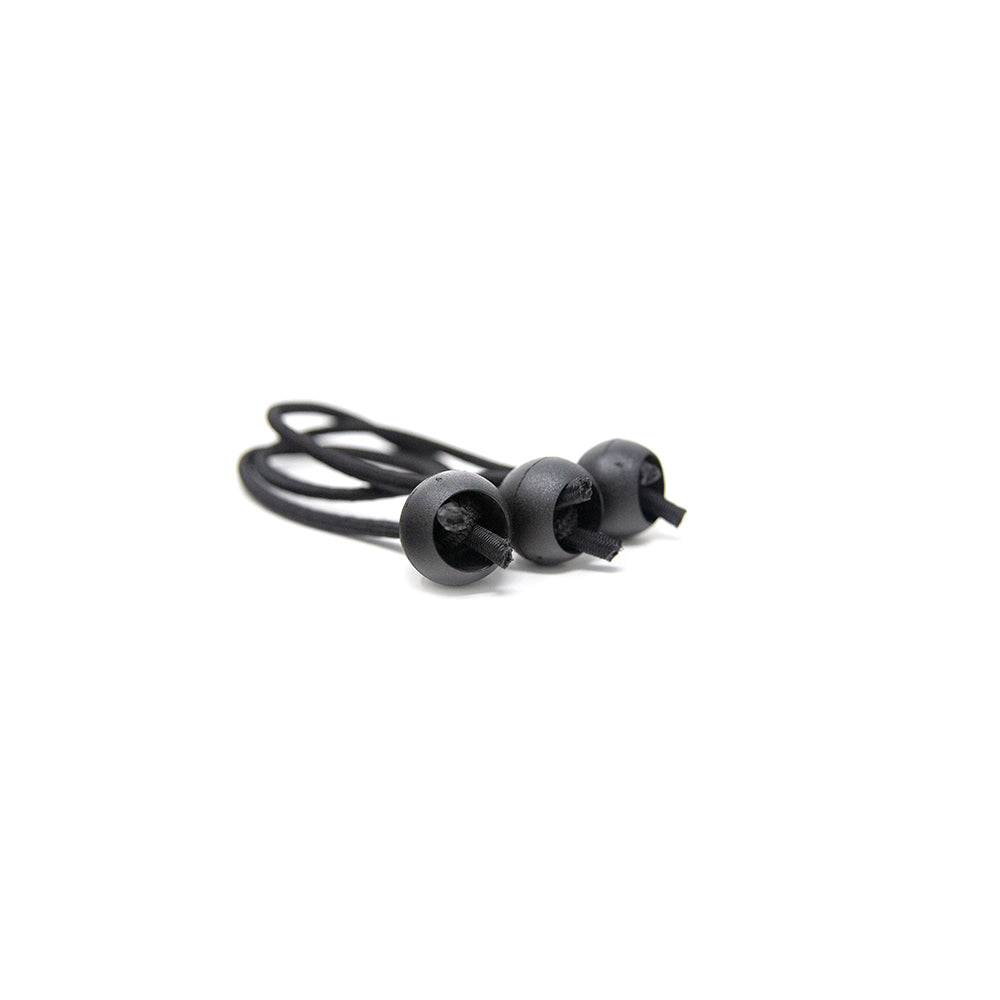 Plastic balls are used to keep the ends of the elastic cord together.