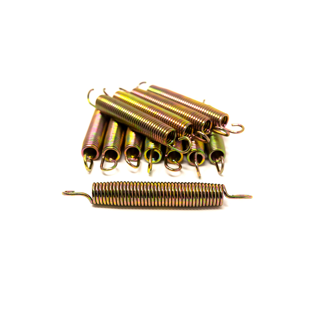11 springs stacked together with one spring laying out in front.