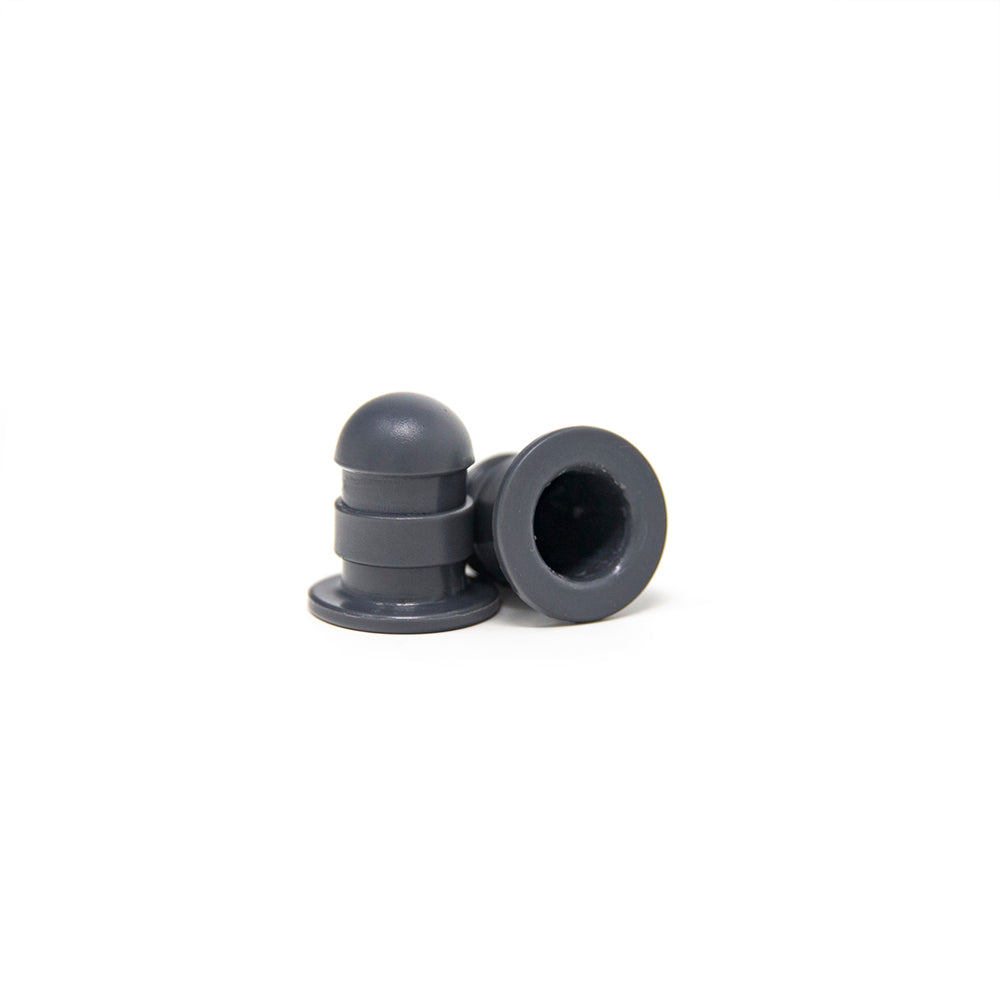 Dark gray pole caps designed for mini trampoline.
