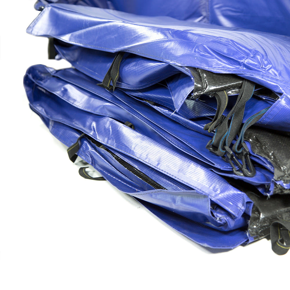 The blue spring pad comes with straps to help secure it on the trampoline.
