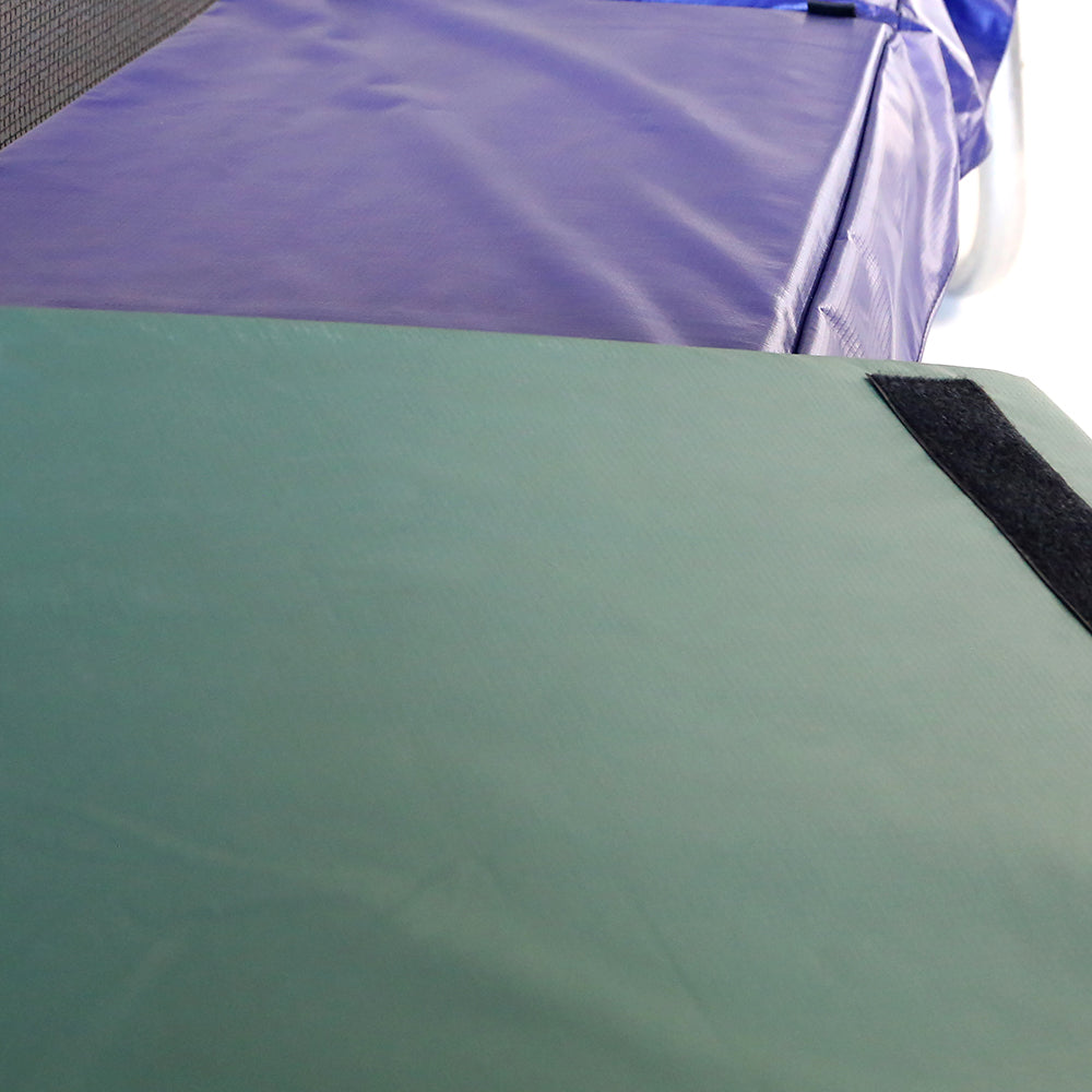The PVC spring pad is reversible, green on one side and blue on the other side.