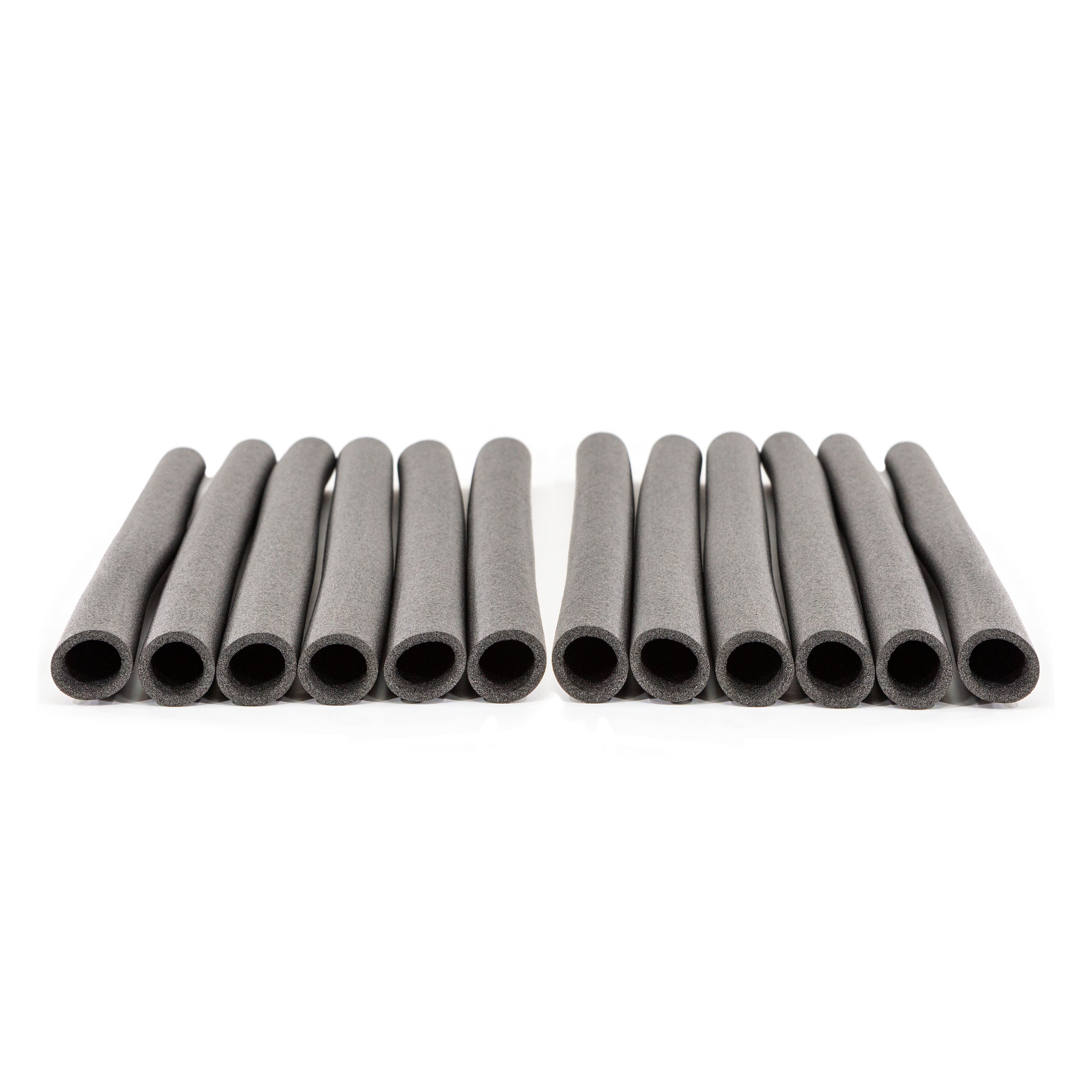 Twelve enclosure foam pieces lying in neat rows.