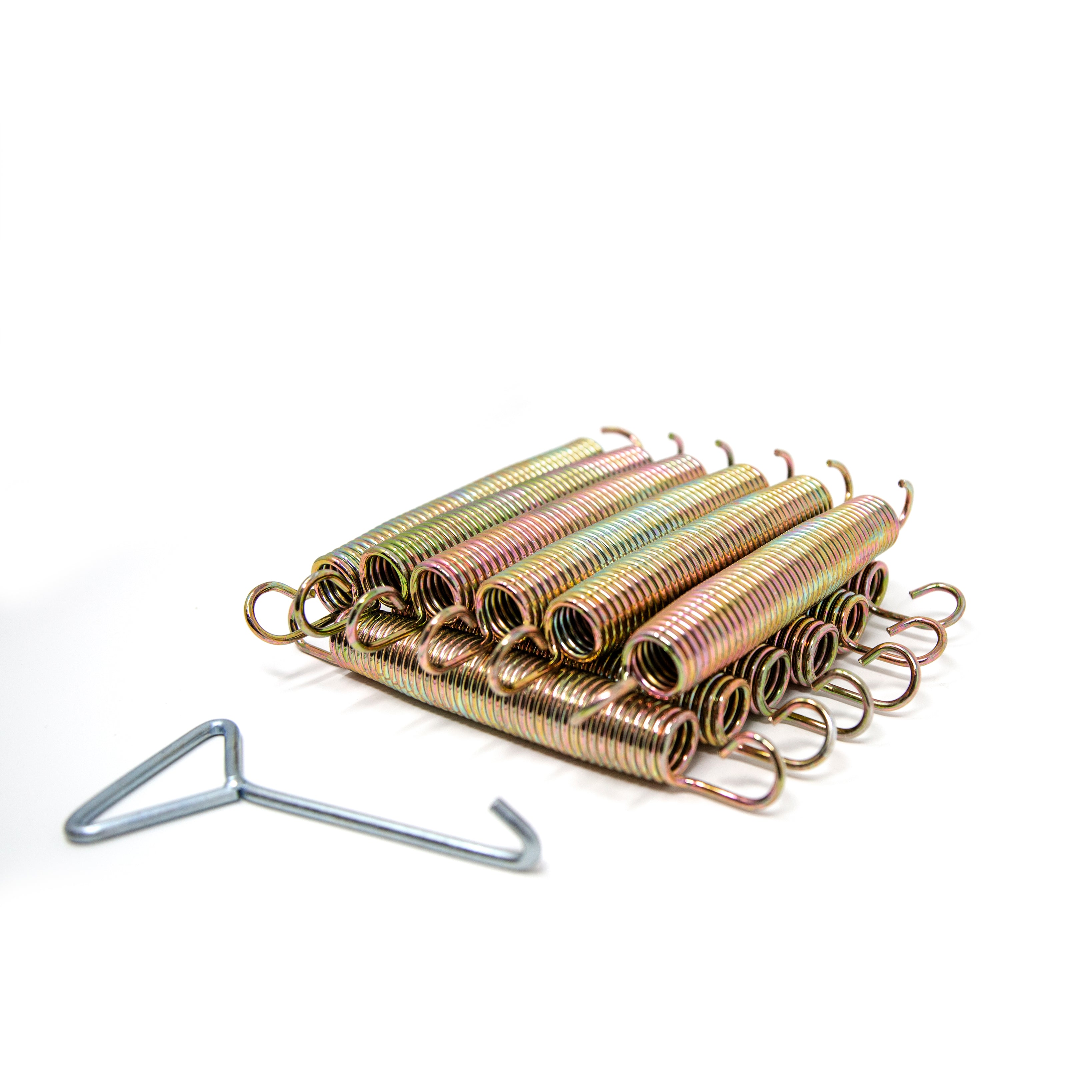 12 springs are stacked neatly together with a spring puller sitting next to them.
