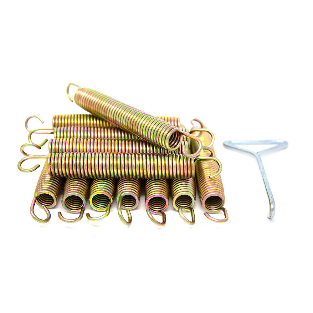 12 springs in a pile with a silver spring puller next to them.