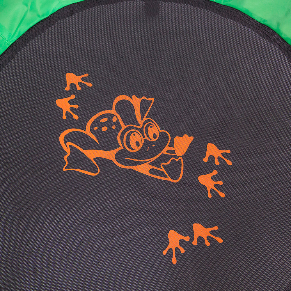 Orange frog design is centered on the black jump mat.