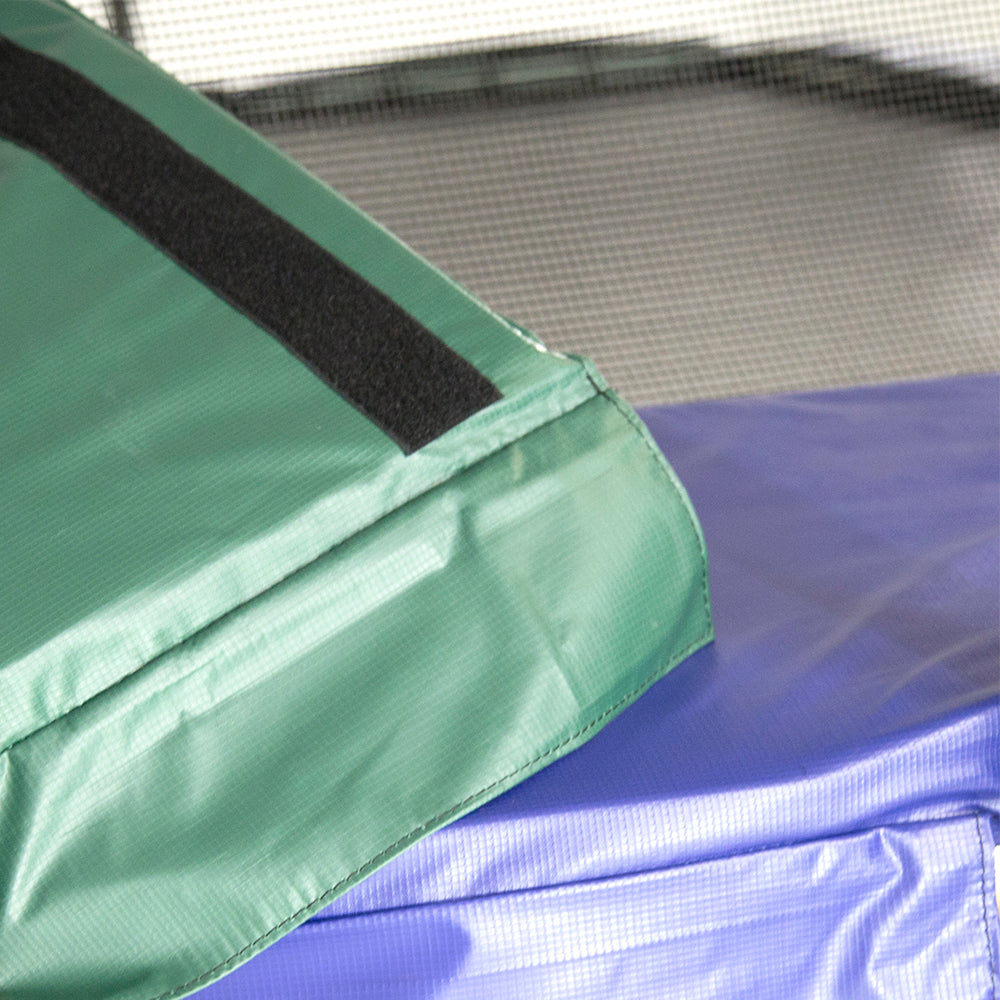 The spring pad is reversible with green on one side and blue on the other.