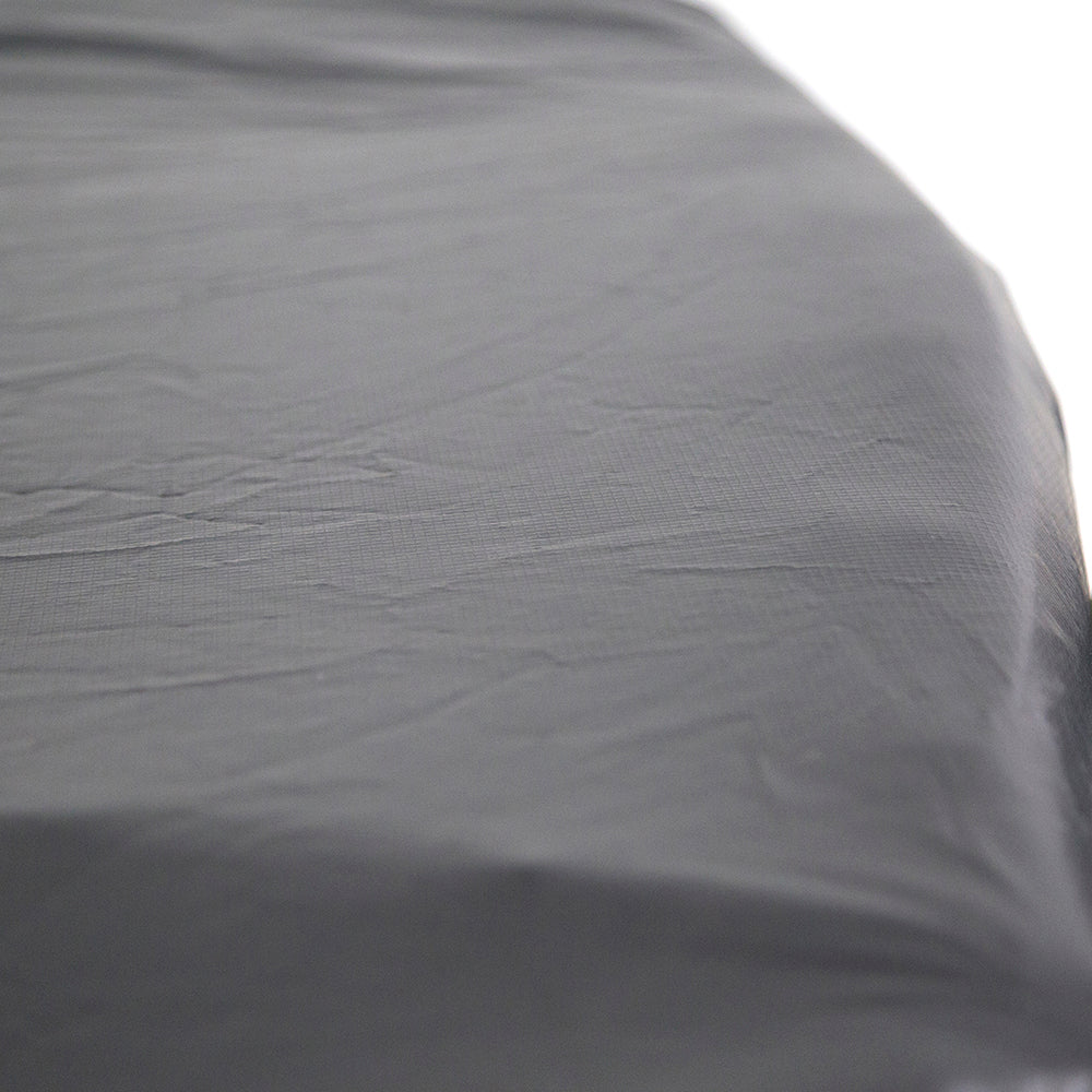 The trampoline weather cover is made of vinyl-coated, UV-resistant PVC material.