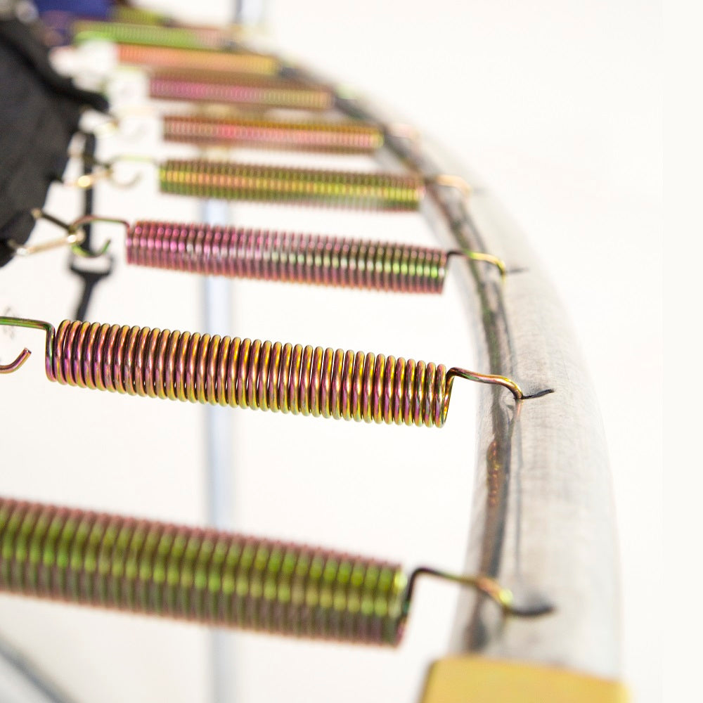 Shiny galvanized steel springs attach the trampoline frame to the jump mat.