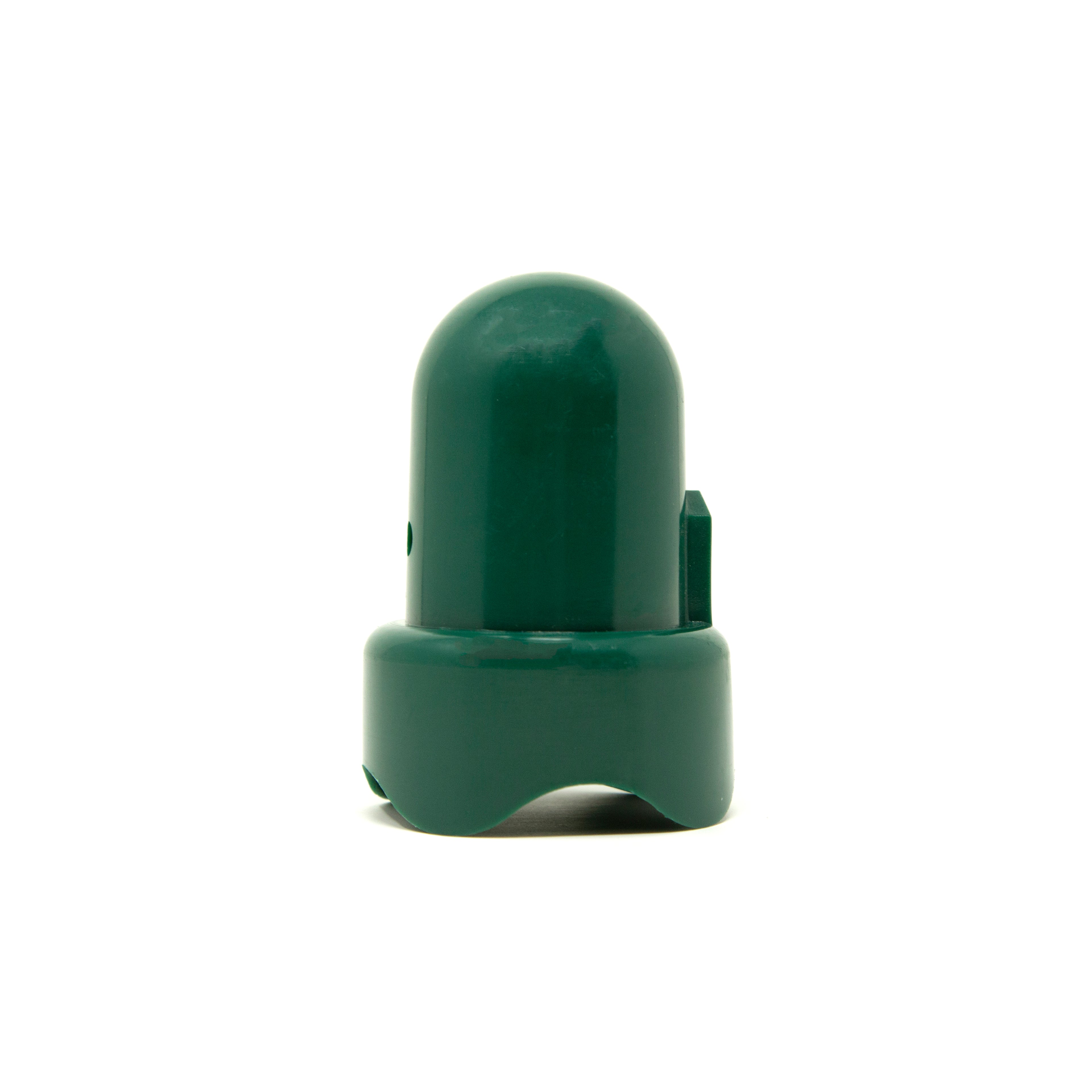 Dark green pole cap seen from a side view. 