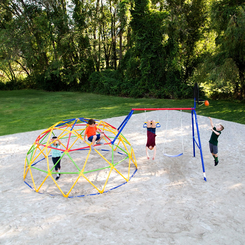 2 kids play on the 10-foot Geo Dome, 1 kid hangs upside down on the trapeze bar, and 1 kid shoots a basketball. 